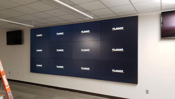 Video wall in a white wall